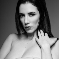 Sultry Jelena Jensen in Black Nylons and big Tits