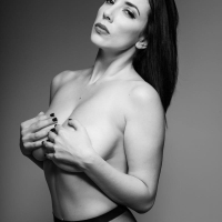 Sultry Jelena Jensen in Black Nylons and big Tits