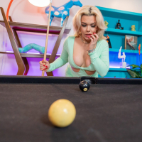 Kimber Woods teases and masturbates on the pool table