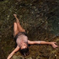 Sexy babe Cara Mell showing her hairy pussy by the ocean