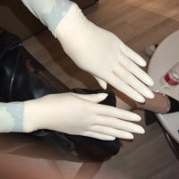 Tught Latex gloves on