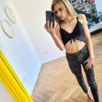 Slim chick Bonnie Dolce strips naked revealing her tiny naked tits