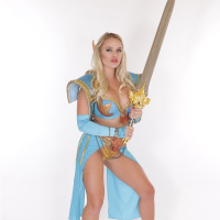 Busty elf Alexis Monroe shows off her curvy body