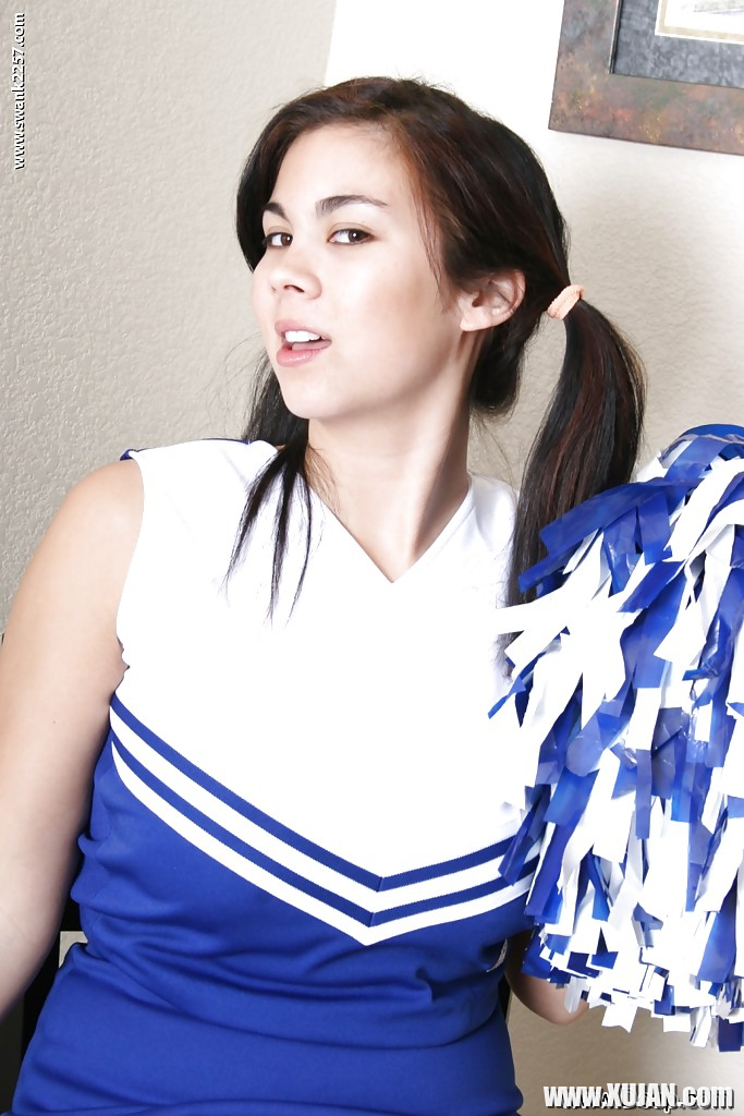 Pigtailed Asian cheerleader Mai Ly flashing pretty upskirt underwear - Photo #739470