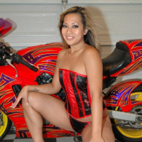 Asian vixen Gianna Lynn exposes her pair of small tits while riding a cock on webcam