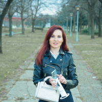 Foxy redhead Jeny Smith shows her sexy legs during winter walk