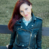 Foxy redhead Jeny Smith shows her sexy legs during winter walk