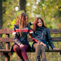 Hot Jeny Smith and her friend posing in pantyhose outdoors