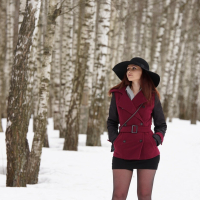 Redhead Jeny Smith showing off her nice tits outdoors