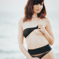 Amazing hottie Jeny Smith showing off her body on the beach