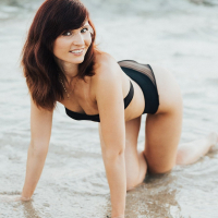 Amazing hottie Jeny Smith showing off her body on the beach