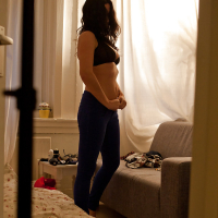 Busty amateur Mina is secretly filmed dressing her naked body
