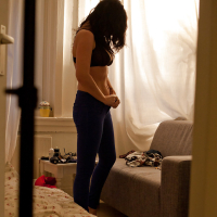 Busty amateur Mina is secretly filmed dressing her naked body