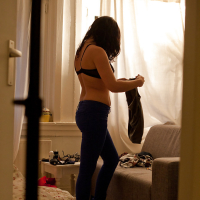 Busty amateur Mina is secretly filmed dressing her naked body