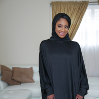 Chocolate beauty Lala Ivey drops down her hijab and fucks her host
