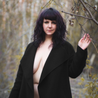 Katrin Porto teasing with her big tits and hairy pussy outdoors