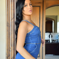 Mila Monet seductively strips and teases on camera