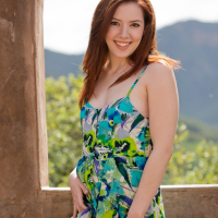 Redhead Ember Stone reveals a nice hairy Snatch