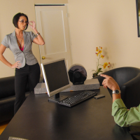 Sexy mature Latina Dylan Ryder fully clothed in hot office seduction