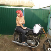 Redhead babe really likes my new bike