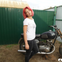 Redhead babe really likes my new bike