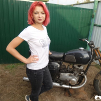 Redhead babe really likes my new bike