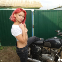 Redhead babe really likes my new bike