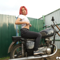 Redhead babe really likes my new bike