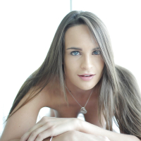 Stunning tanned brunette Teal Conrad shows off her hairy pussy