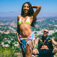 Lusty ebony Olivia Jayy flashes her nice curves