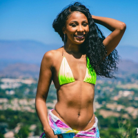 Lusty ebony Olivia Jayy flashes her nice curves