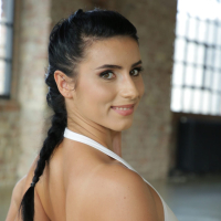 Stunning Nelly Kent takes off her white leotard