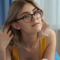 Shy young Eva Elfie seductively spreads sexy legs
