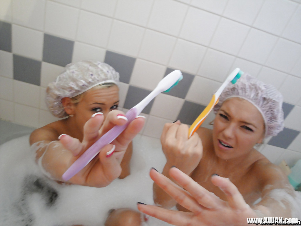 Young dykes Kasey Jordan and Ally Kay in bathtub with suction dildo - Photo #804276