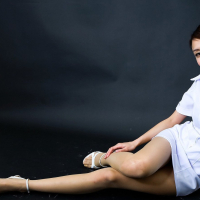 Slim japanese girl Eva shows off her nice long legs