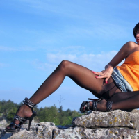 Hot and sexy milf Lily Wow relaxing in black pantyhose