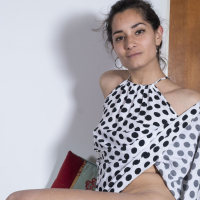 Playful dark haired chick Tiffany plays with her own bushy lovebox