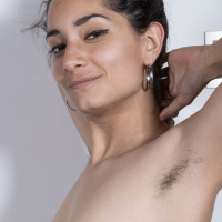 Playful dark haired chick Tiffany plays with her own bushy lovebox
