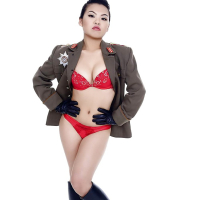 Oriental pornstar Cindy Starfall posing solo in military garb