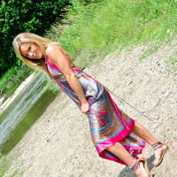 Beautiful blonde Meet Madden getting naked by a creek
