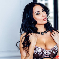 Brunette solo girl Anissa Kate releasing great tits from sexy bra
