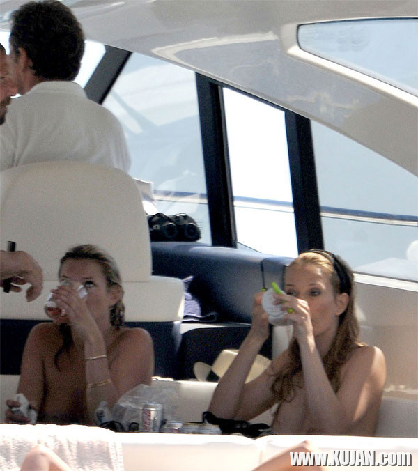 Kate Moss showing great topless on a boat - Photo #824666
