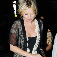 Kate Moss showing great topless on a boat