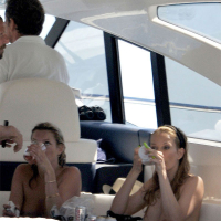 Kate Moss showing great topless on a boat