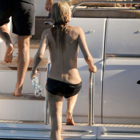 Kate Moss showing great topless on a boat