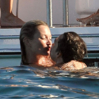 Kate Moss showing great topless on a boat
