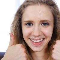 Petite young girl Rachel James has her shaved twat spread wide