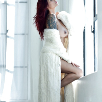 Leggy MILF pornstar Tera Patrick unveils large tits and tats in high heels