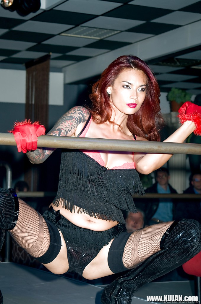 Asian pornstar Tera Patrick strutting in black stockings and boots - Photo #829755