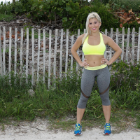 Blonde babe Cristi Ann models outdoors in yoga pants during sports workout